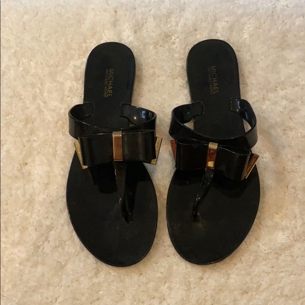 Black and Gold Michael Kors Bow flip flops